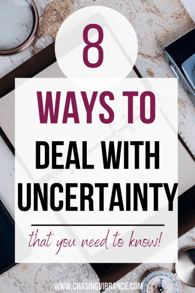 background of globe and travel journal with text overlay "8 ways to deal with uncertainty