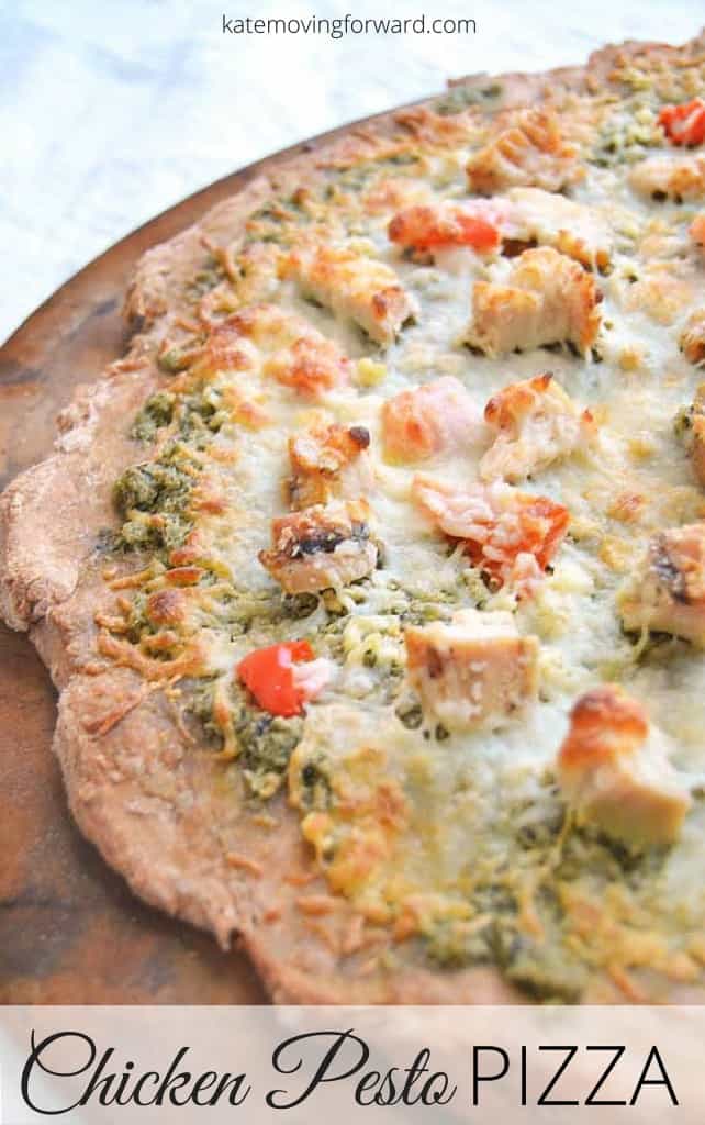 Chicken Pesto Pizza - a delicious and easy homemade pizza with fresh garlic, pesto, chicken, and roasted red peppers! YUM!!