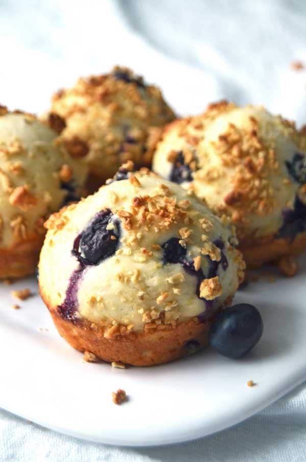Lemon Blueberry Muffins with granola topping are a delicious and healthy breakfast muffin. Perfect for spring brunch or an easy snack! 
