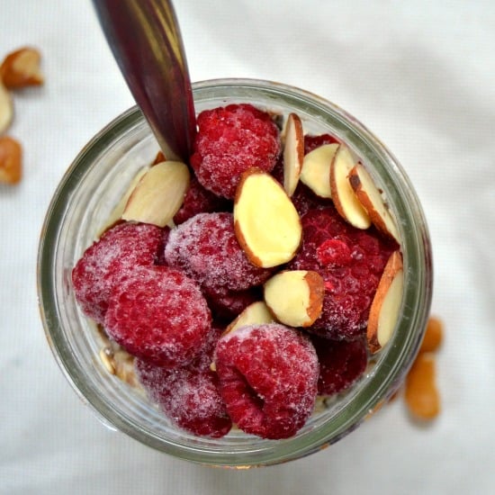 Raspberry, almond, overnight oats in a mason jar