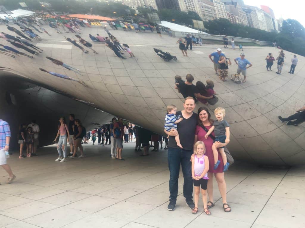 Family in Chicago in front of the bean statue