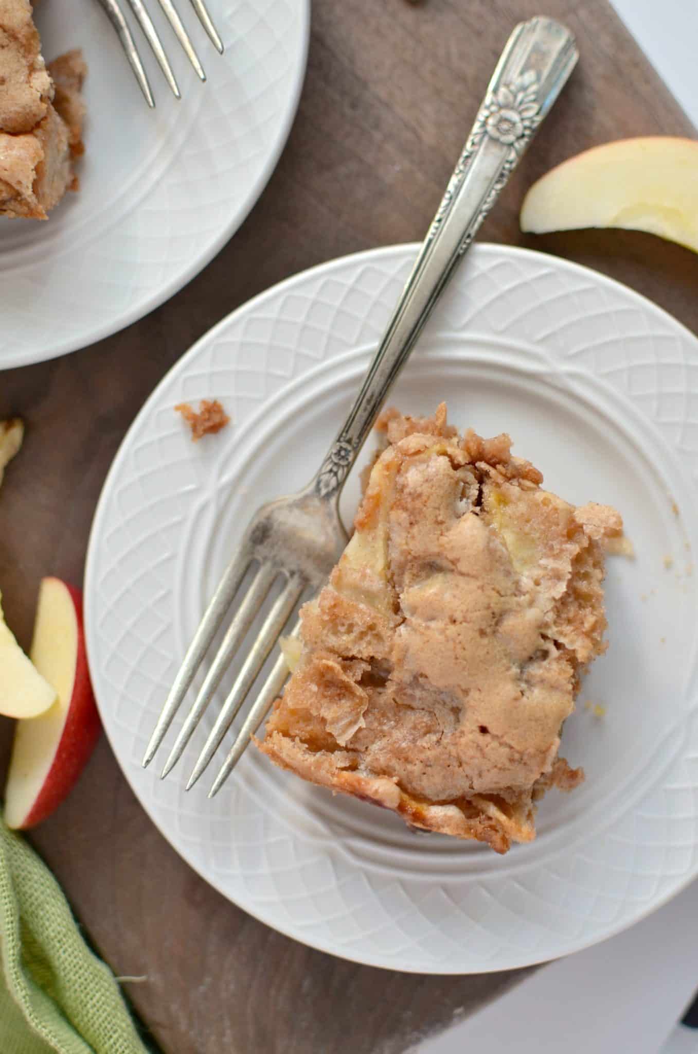Apple Cake on small cream plate with antique fork