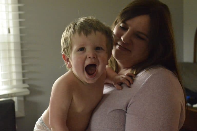 baby in his mother's arms