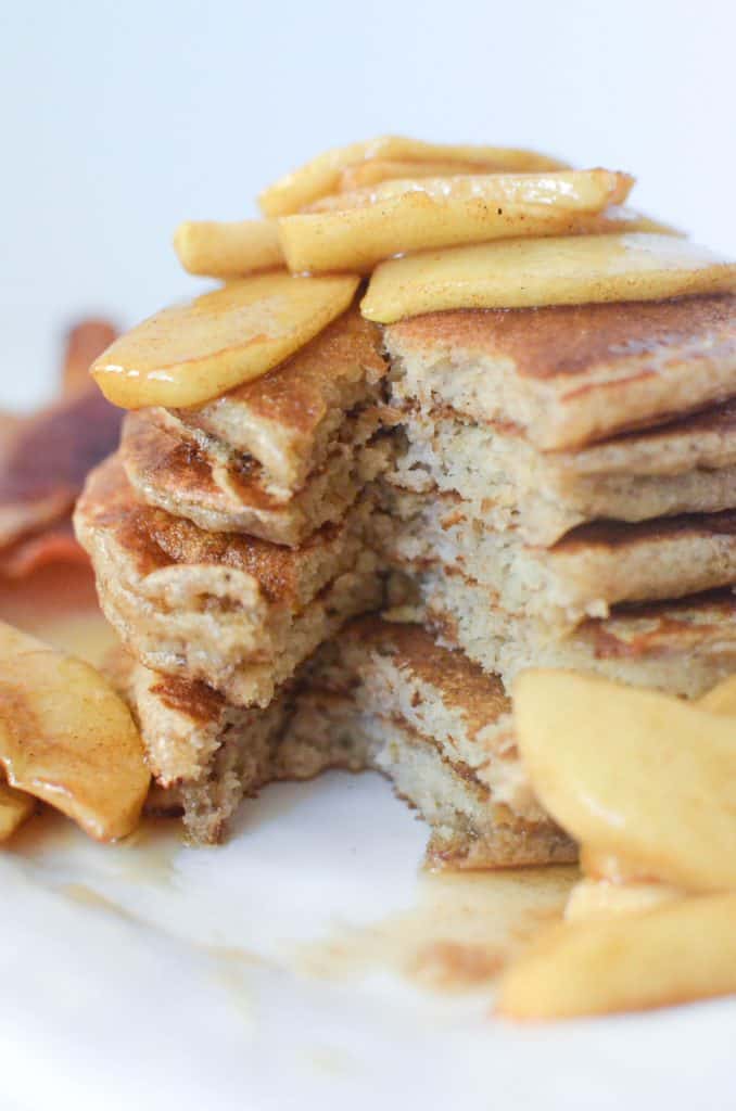 Apple cinnamon pancakes topped with maple cinnamon apple slices