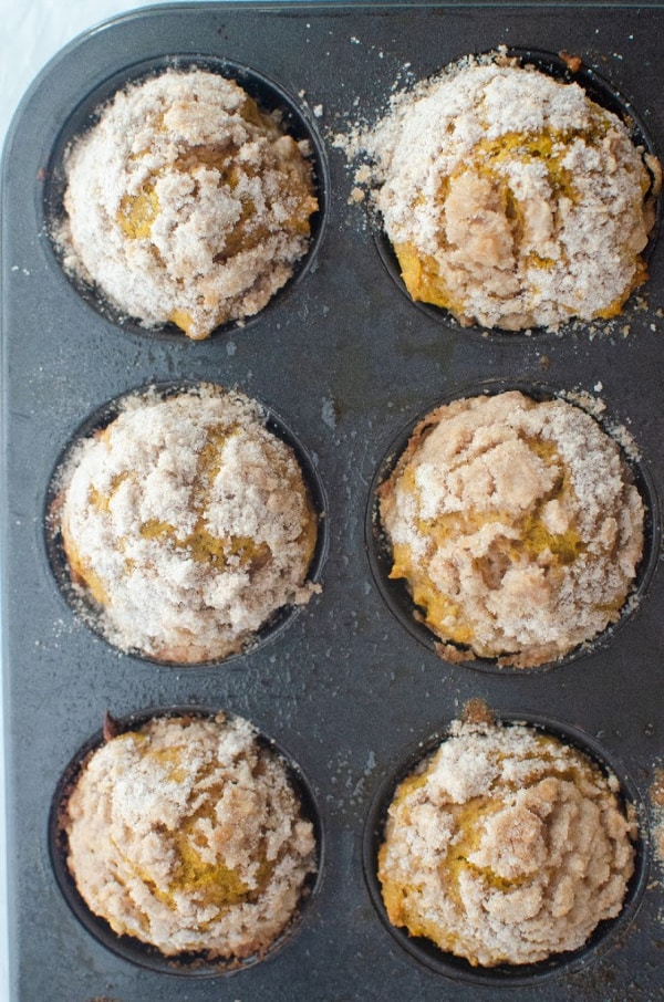 healthy pumpkin muffins in a gray muffin tin