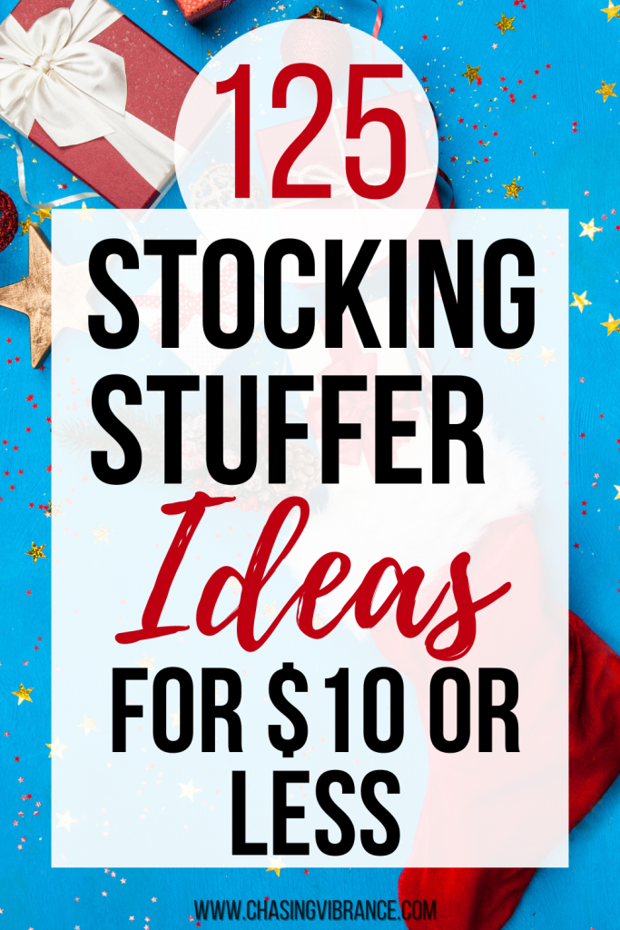 Red stocking with white cuff spills stocking stuffers onto blue background with stars and confetti. Text overlay reads: 125 Stocking Stuffer Ideas for $10 or less