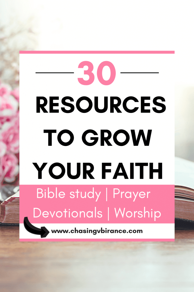 Bible on table with pink flowers behind it with text 30 resources to grow your faith