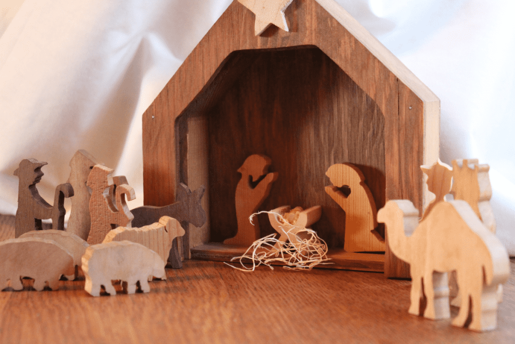 wooden nativity sits on table
