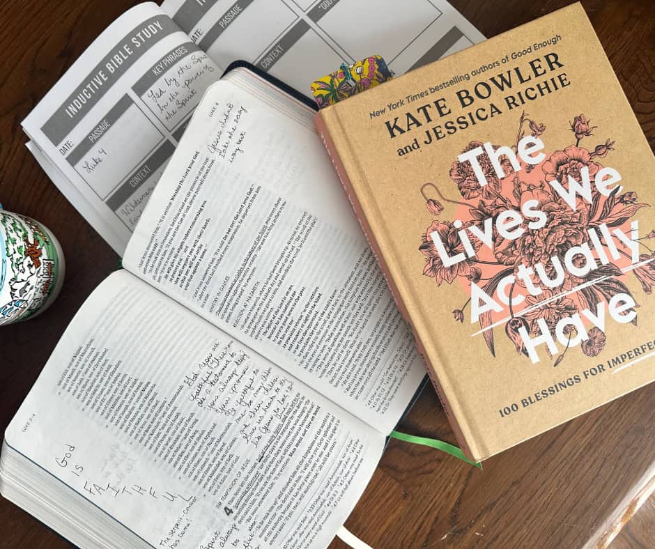 photo of open Bible and Bible study journal open on a table with the book The Lives We Actually Have