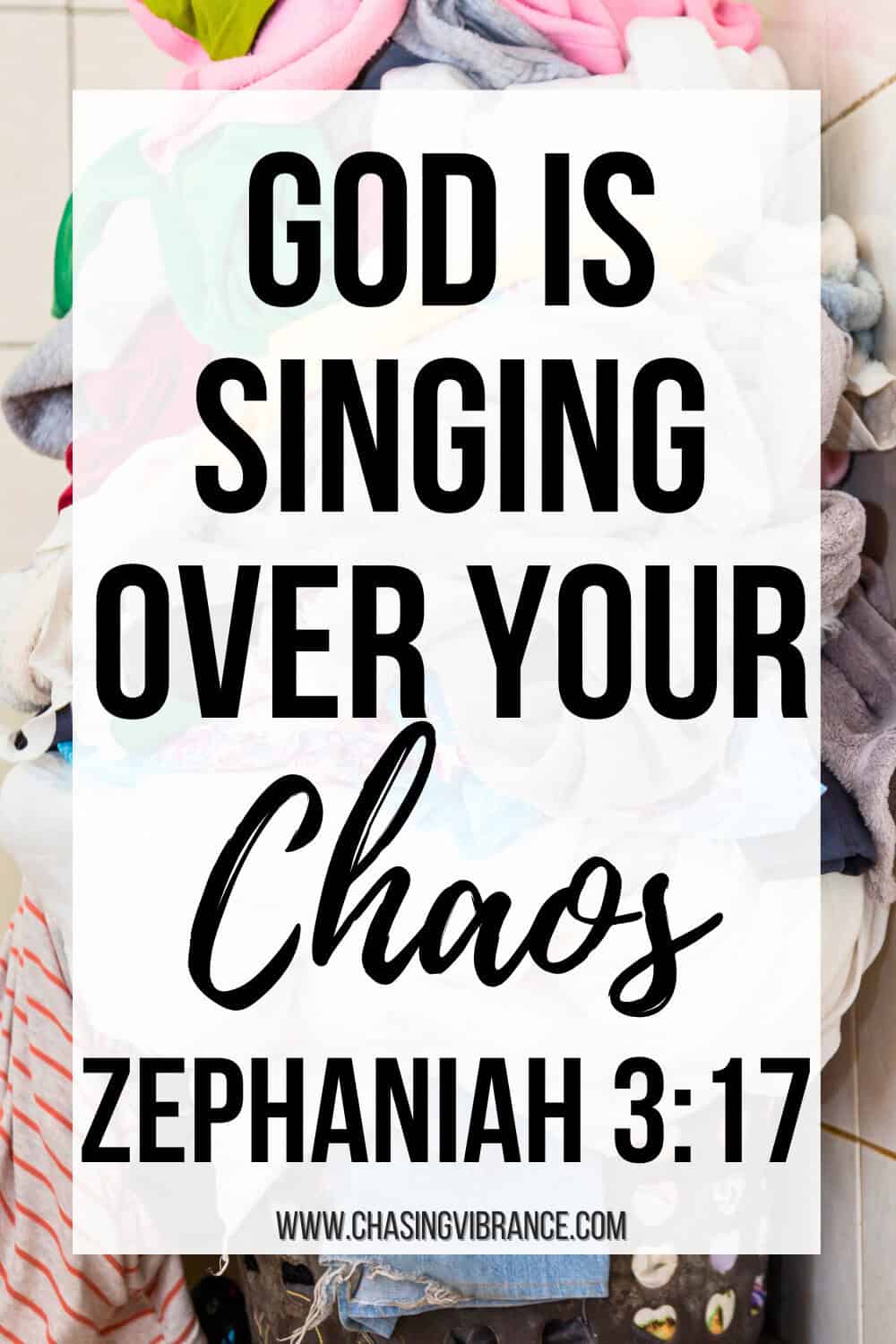 photo of a basket overflowingly high with laundry and the text in large letters: god is singing over your chaos