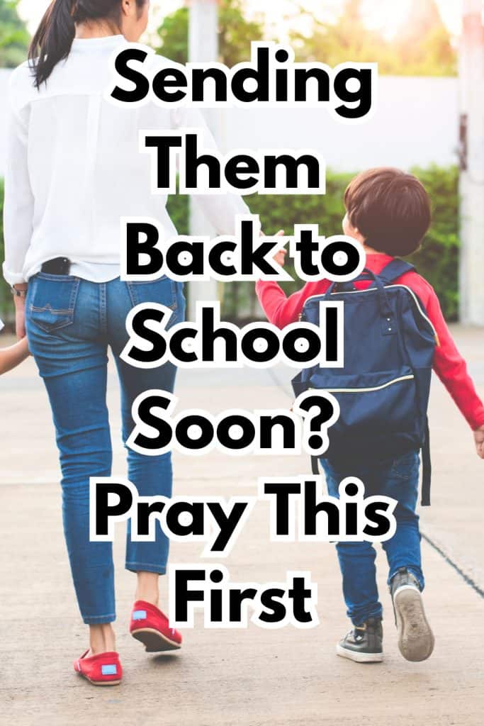 A mom in a white shirt and red shoes walks her small son into school. He's wearing a backpack and a red shirt. Text reads: Sending them back to school soon? Pray this first